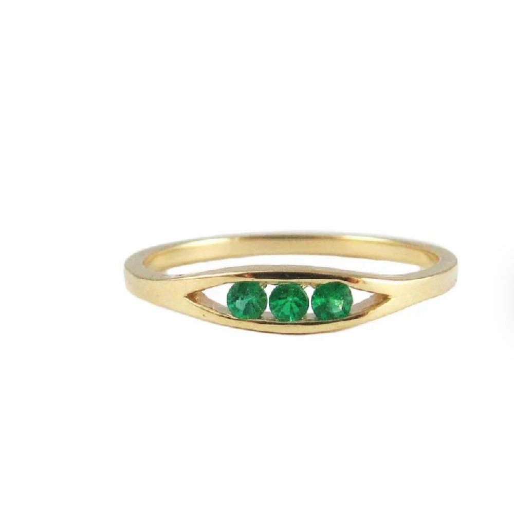 Jennie Kwon floating emerald ring 14k yellow